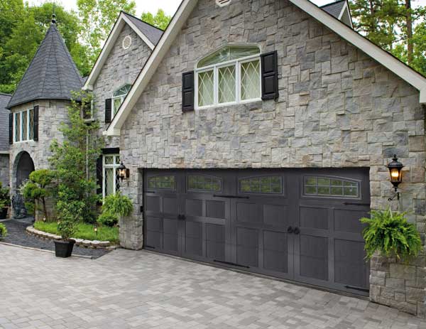 Gray house with large garage door
